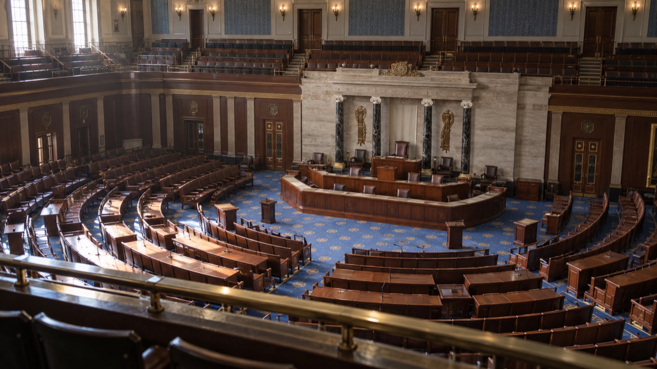 An empty chamber of the United States House of Representatives; conceptual illustration, not a photograph of a forecast event